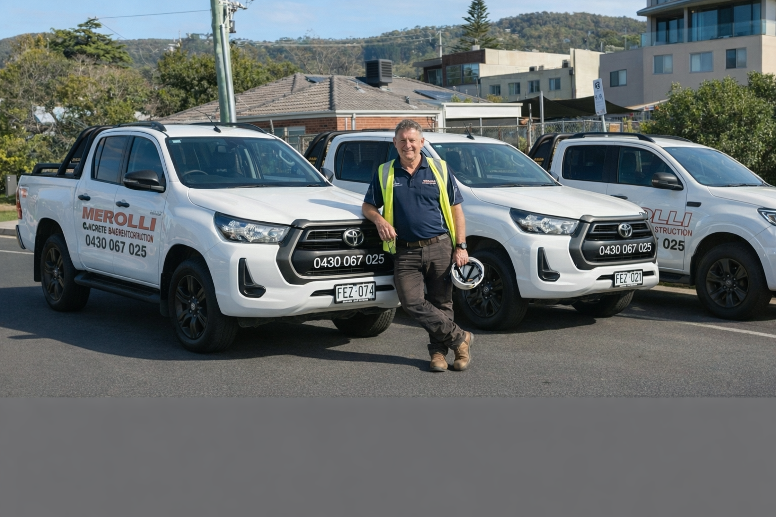 Post tensioning specialist with construction vehicles